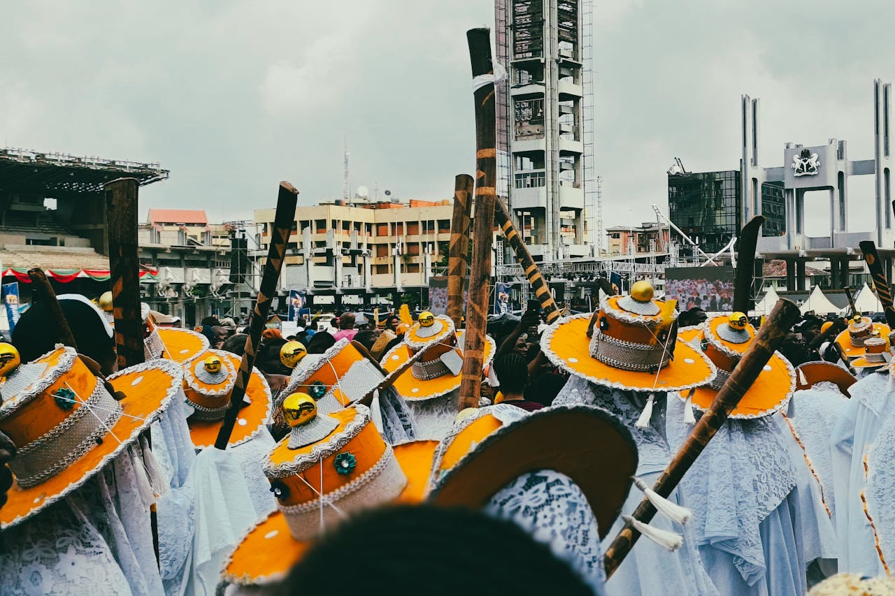 Participants in traditional attire during a lively festival in Lagos, Nigeria.